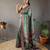 green kalamkari saree with blouse piece