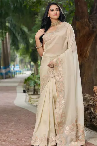 cream embellished sequinned organza saree