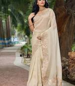 cream embellished sequinned organza saree