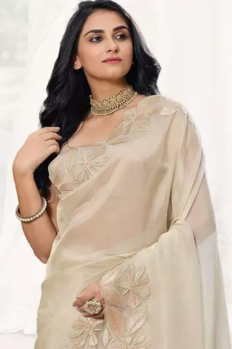 cream embellished sequinned organza saree