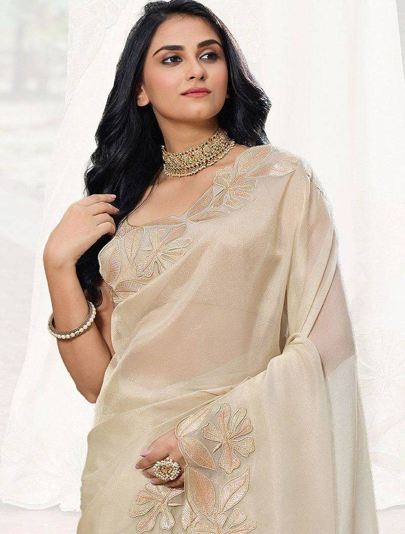 cream embellished sequinned organza saree