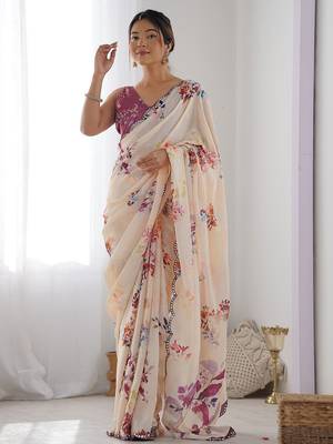Cream floral printed mirror work saree 1