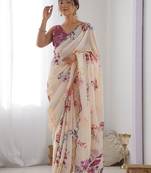 Cream floral printed mirror work saree