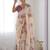 Cream floral printed mirror work saree