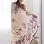 Cream floral printed mirror work saree