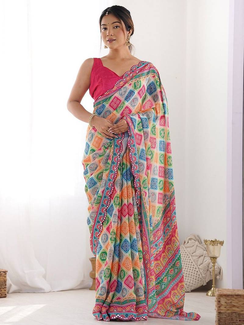 Pink printed embellished mirror work saree