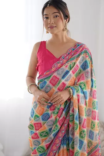 Pink printed embellished mirror work saree
