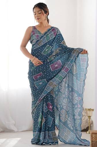 Teal embellished mirror work saree