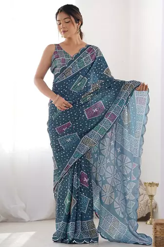 Teal embellished mirror work saree