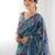 Teal embellished mirror work saree
