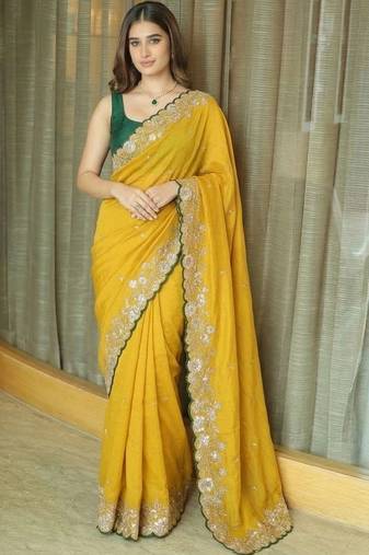 Yellow ethnic motifs embroidered pure chiffon saree