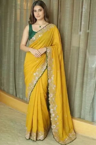 Yellow ethnic motifs embroidered pure chiffon saree