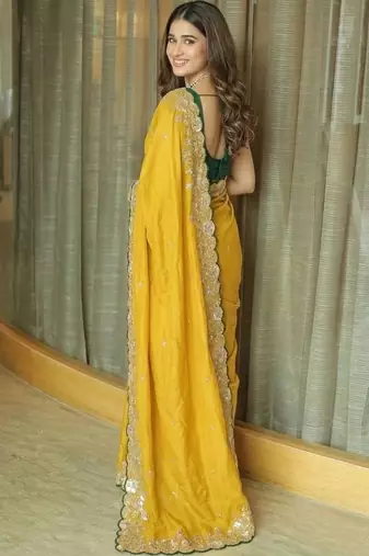 Yellow ethnic motifs embroidered pure chiffon saree