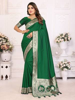 green solid banarasi saree with woven design zari border 1