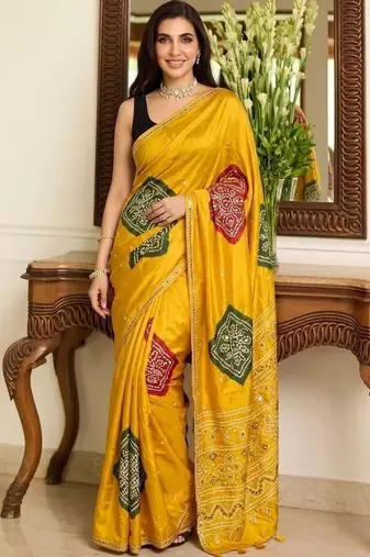 yellow bandhani embroidered bandhani saree
