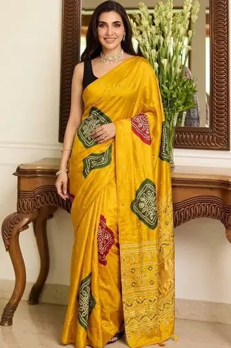 yellow bandhani embroidered bandhani saree