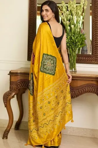 yellow bandhani embroidered bandhani saree