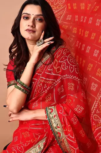 red women embroidered bandhani saree