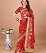 red bandhani printed embroidered saree