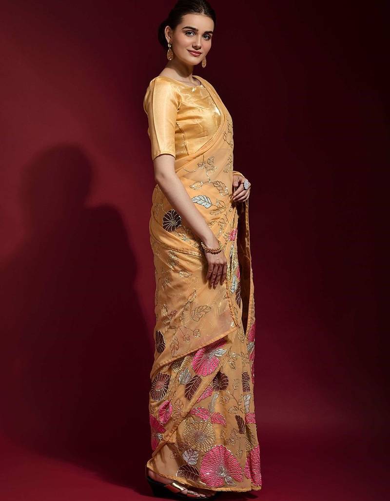 peach ethnic motifs embroidered sequinned poly georgette saree