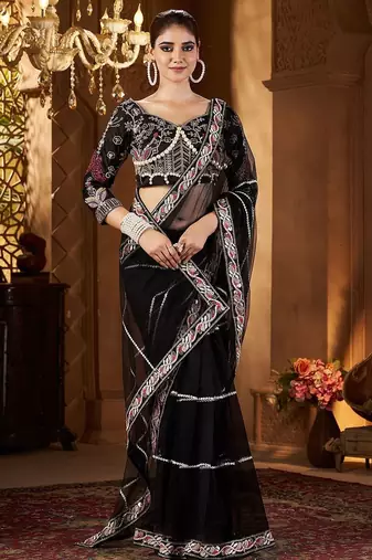 Black women embellished sequinned net saree