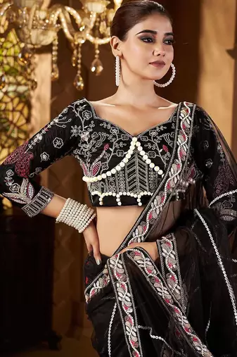 Black women embellished sequinned net saree
