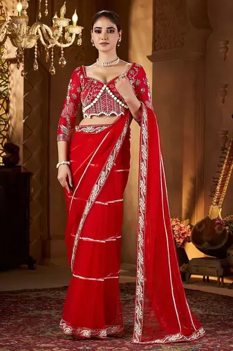 Red embellished embroidered sequinned net saree