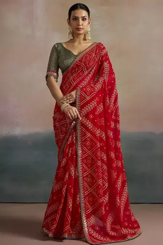 Red printed sequinned pure georgette bandhani saree