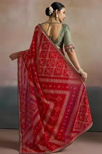 Red printed sequinned pure georgette bandhani saree