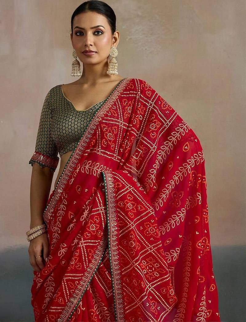Red printed sequinned pure georgette bandhani saree