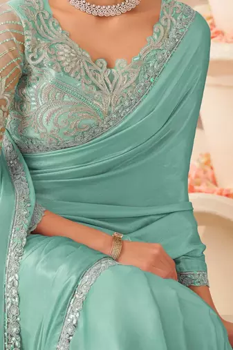 turquoise sequinned pure chiffon saree