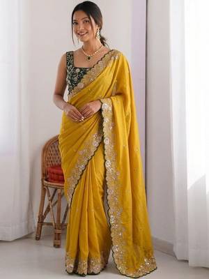 Yellow embellished embroidered pure georgette heavy work saree 1
