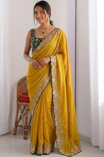 Yellow embellished embroidered pure georgette heavy work saree