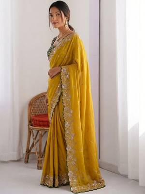 Yellow embellished embroidered pure georgette heavy work saree 2