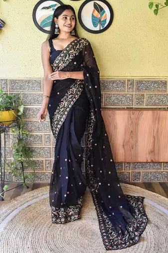 Black black & peach-coloured floral embroidered saree