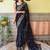 Black black & peach-coloured floral embroidered saree