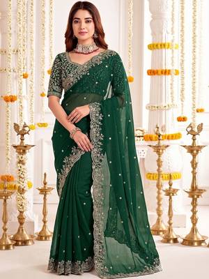 Green ethnic motifs embroidered poly georgette heavy work saree 3