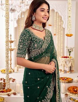 Green ethnic motifs embroidered poly georgette heavy work saree 4