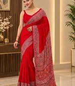 Red ethnic motifs mirror work saree