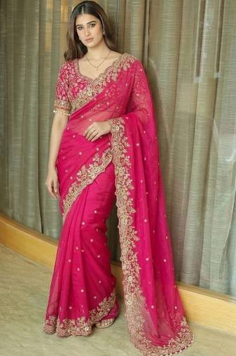 Pink ethnic motifs embroidered satin saree