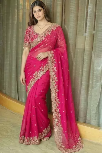 Pink ethnic motifs embroidered satin saree