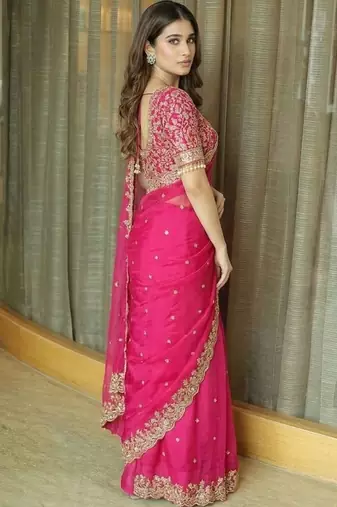 Pink ethnic motifs embroidered satin saree