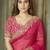 Pink ethnic motifs embroidered satin saree