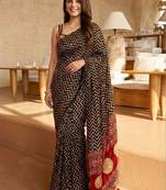 Black ajrak block mirror work saree