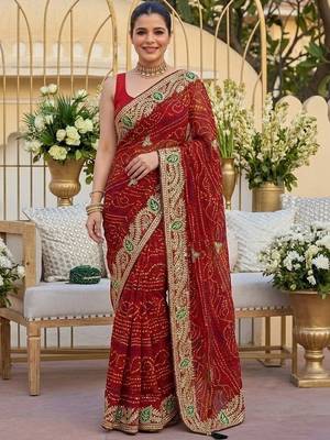 Red ethnic motifs embroidered pure georgette heavy work bandhani saree 1