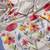 Cream floral printed tissue jamdani saree