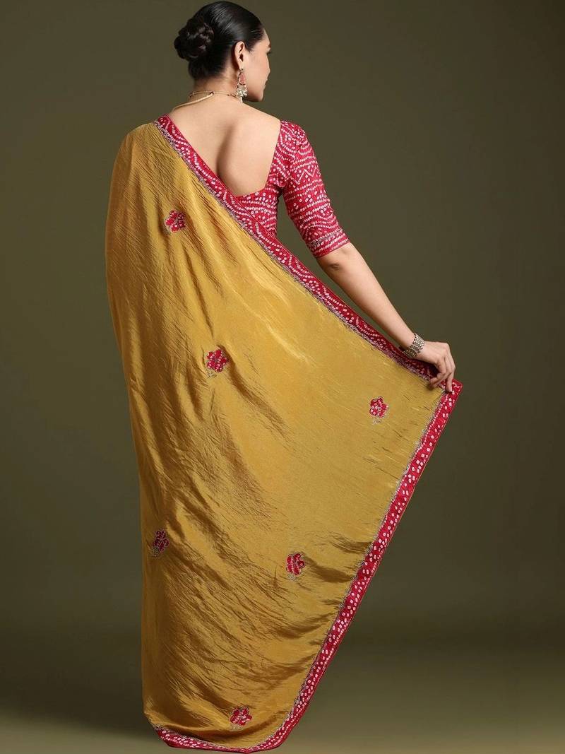 Mustard floral embroidered tissue designer saree