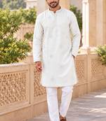 Classic cream linen kurta pyjama set with delicate embroidery