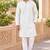 Classic cream linen kurta pyjama set with delicate embroidery