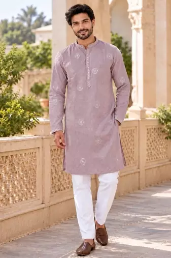 Graceful dusty pink linen kurta pyjama set with elegant embroidery